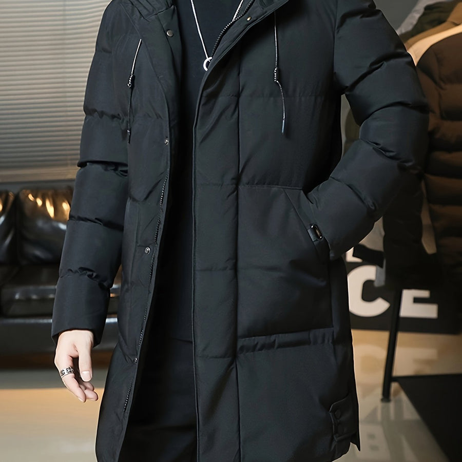 Manteau matelassé long, à capuche, fermeture éclair et boutonnage, coloris noir